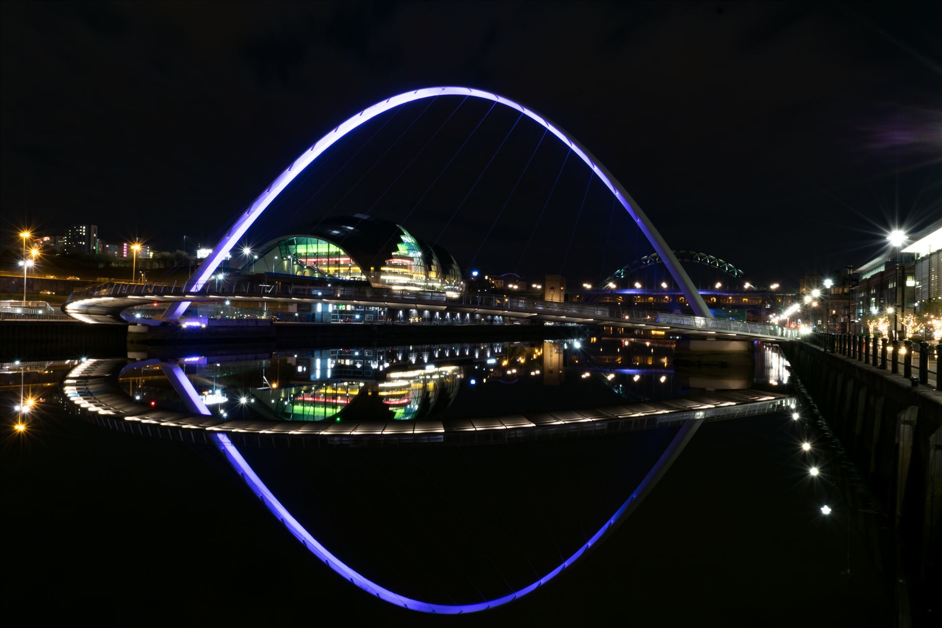 Millennium Bridge and Baltic Reflection - Millennium Bridge at night by AJ Stoves Photography